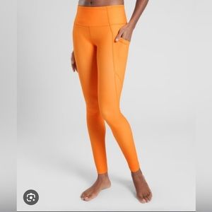 ATHLETA Stash Pocket Salutation Tight with Powervita Fabric, sz M